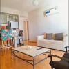Living del Departamento en Av. Del Libertador y Mendoza con sillón cama, aire acondicionado